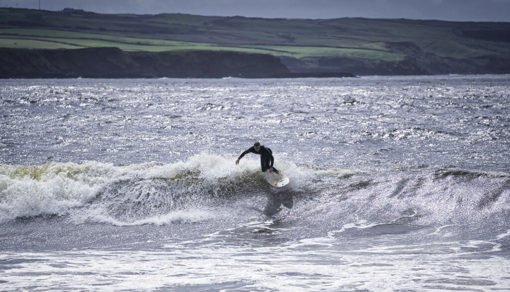 Surfing at Lahinch Beach
